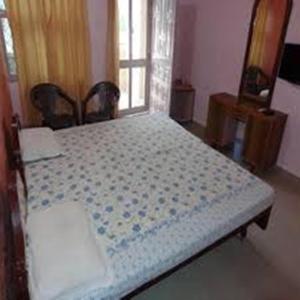 Voodi või voodid majutusasutuse Hotel Om Pushkar toas