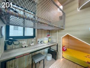 Cucina o angolo cottura di Wind Natural Parent-child Inn