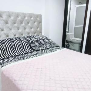 Postel nebo postele na pokoji v ubytování Privado y fascinante Apartaestudio San Alonso