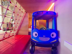 Letto o letti in una camera di Wind Natural Parent-child Inn