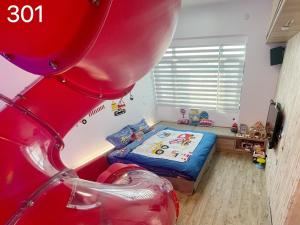 Letto o letti in una camera di Wind Natural Parent-child Inn
