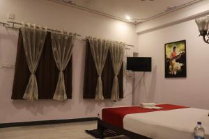 Krevet ili kreveti u jedinici u okviru objekta Hotel Shiv Palace
