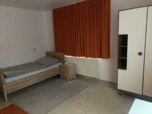 Postel nebo postele na pokoji v ubytování Monteure & Handwerker einfach, unkompliziert und preiswert in Alsfeld + 7 fotografií