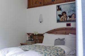 Posteľ alebo postele v izbe v ubytovaní Hotel Bella di Bosco
