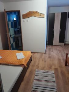 Giường trong phòng chung tại Apartamente Ambrus E Studio 21 Praid