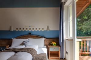 Posteľ alebo postele v izbe v ubytovaní Hotel Bella di Bosco
