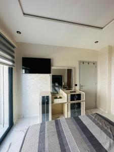 TV a/nebo společenská místnost v ubytování Martil dream with private garage