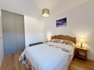 Säng eller sängar i ett rum på Appartement Samoëns, 2 pièces, 4 personnes - FR-1-624-113