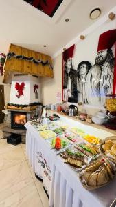 a table with food on it in a kitchen at Harenda in Zakopane