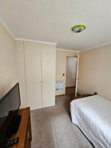 Uma cama ou camas num quarto em Apartamento full equipado