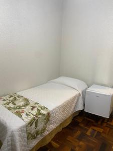 Postel nebo postele na pokoji v ubytování Hotel Pax