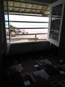 a view of a room with a window and a floor at Balcon Del Tigre in Aguas Dulces