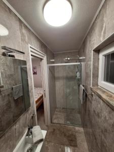 Ένα μπάνιο στο Apartman Kristina