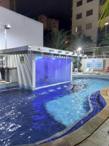 Bazén v ubytování Residencial Thermas do Bandeirante nebo v jeho okolí