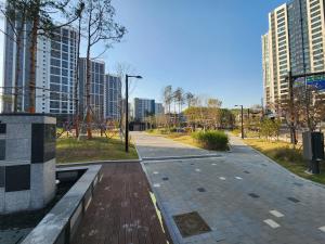 an empty street in a city with tall buildings at World-cup stadium, New house, full optioned in Goyang