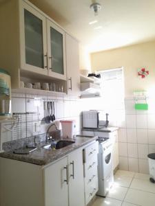 Kuchyň nebo kuchyňský kout v ubytování Residencial Thermas do Bandeirante