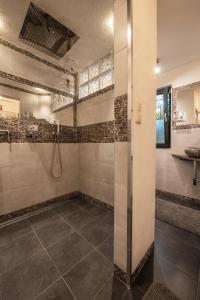 a bathroom with a shower and a sink at Boutique Apartments Benz I-III in Bergisch Gladbach