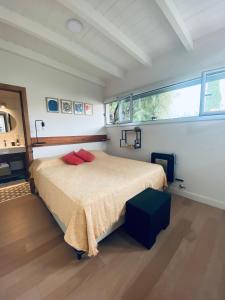 En eller flere senge i et værelse på Departamento a estrenar