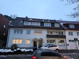 a white car parked in front of a house at Wohnreich Blaustein Mitte -1A- 2er WG in Blaustein