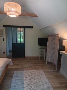 Postel nebo postele na pokoji v ubytování La chambre des daines