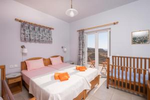 Postel nebo postele na pokoji v ubytování Cretan View