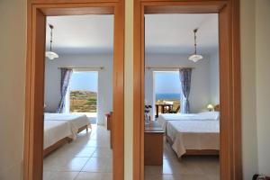 Postel nebo postele na pokoji v ubytování Cretan View