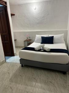 Katil atau katil-katil dalam bilik di Merak Hostel