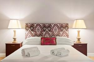 Krevet ili kreveti u jedinici u okviru objekta Tornabuoni Living - Luxury Apartments Collection