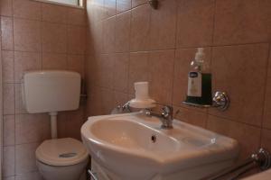 Koupelna v ubytování Apartment Jure