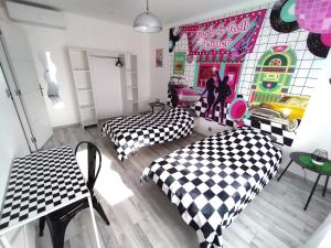 Posteľ alebo postele v izbe v ubytovaní GITE diner AMERICAIN