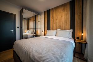 Ένα ή περισσότερα κρεβάτια σε δωμάτιο στο ARHEYA 8 apart/АРХЕЯ 8 апартамент за гости