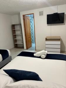 Katil atau katil-katil dalam bilik di Merak Hostel