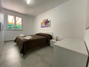 A bed or beds in a room at Villa indipendente le coccinelle beach mare piscina a 250 mt dal mare con servizio di piscina a 400 mt 12 k da Cefalu Még 37 kép