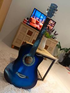 TV a/nebo společenská místnost v ubytování SMDC Grass Residences