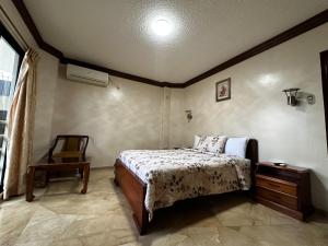 Letto o letti in una camera di Hotel Bucaneiro