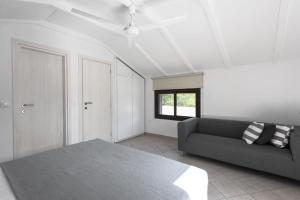 A bed or beds in a room at Elani Cactus House