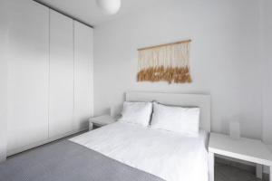 A bed or beds in a room at Elani Cactus House