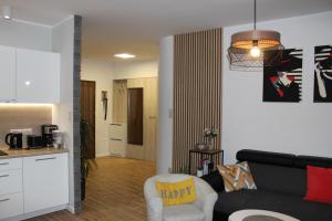 Kuchnia lub aneks kuchenny w obiekcie Sunny Adventure Baltic Apartament