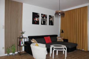 Część wypoczynkowa w obiekcie Sunny Adventure Baltic Apartament