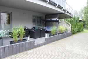Ogród w obiekcie Sunny Adventure Baltic Apartament