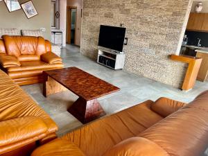 a living room with a couch and a coffee table at Sudresidence in Agadir