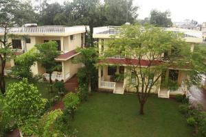 Vrt pred nastanitvijo Hotel Rainforest