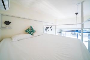 Postel nebo postele na pokoji v ubytování 田園走走