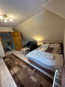 Posteľ alebo postele v izbe v ubytovaní Apartamenty Złota Palma