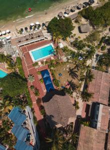an overhead view of a beach with a swimming pool at Hotel Dorado Plaza Punta Arena in Tierra Bomba