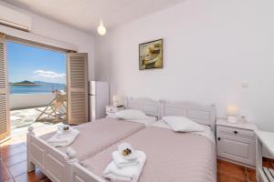 Postel nebo postele na pokoji v ubytování Agali bay hotel