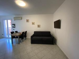 Posezení v ubytování Alghero Lido Apartment