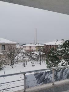 a view of a snow covered city from a balcony at 1915 Çanakkale Köprü manzarali 700m2 bahceli mustakil ev in Canakkale