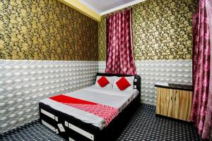 Cama o camas de una habitación en OYO Hotel Rao Residency