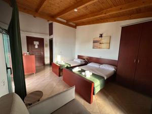 Ένα ή περισσότερα κρεβάτια σε δωμάτιο στο BLISS Hotel